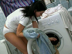 Perverted teen in white panties masturbates pussy on a washing machine