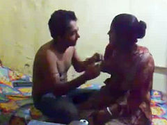 Horny Indian man caressing slim body of his gf