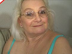Grandma plays with her tits and cunt before giving head