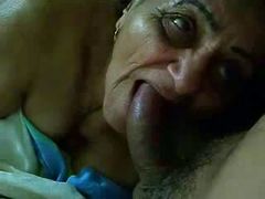 Indian grandma happily blows dick of her young lover