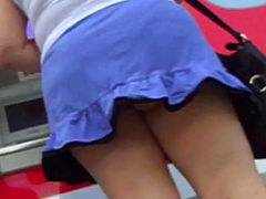Reality outdoor upskirt with leggy babe