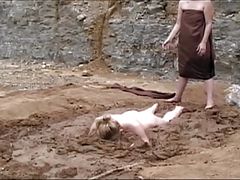 Naked Girl Falling Facefirst in Mud
