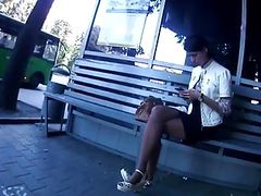 candid pantyhose crossed legs in bus stop